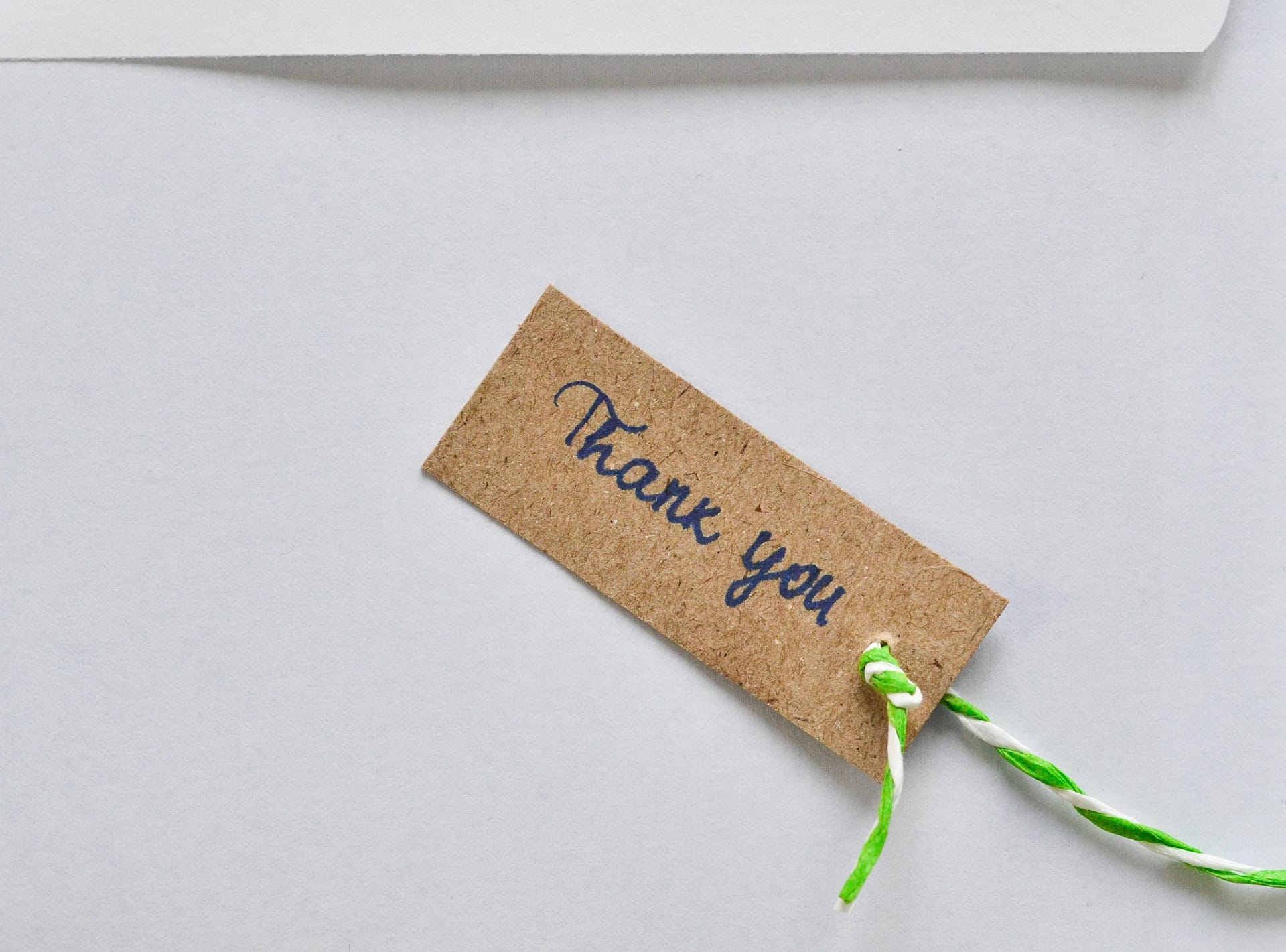 Handwritten thank you gift tag representing nonprofit donor acknowledgment and stewardship